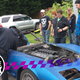 You can’t help but stare at a Corvette full of BMW parts getting its top sawzalled off.